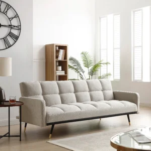 Canapé convertible ROREMA beige capitonné avec pieds en métal noir et doré