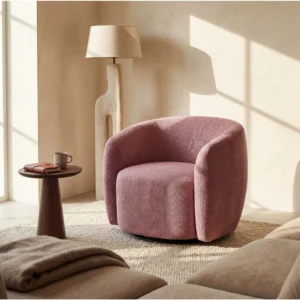 Fauteuil VEREIDE rose en tissu texturé avec assise pivotante et accoudoirs