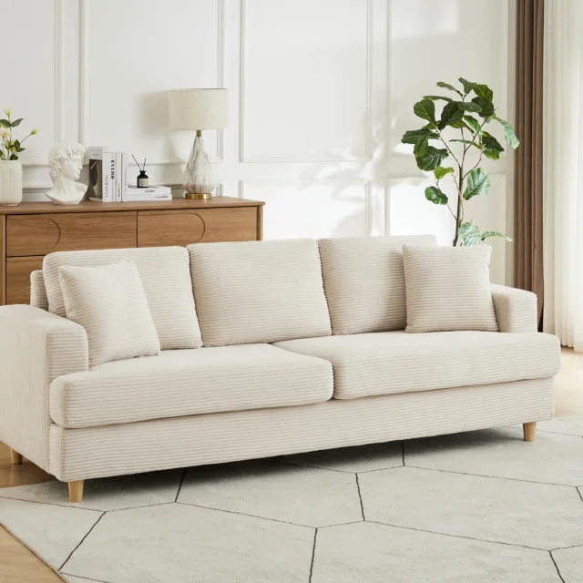 Canapé YOCABA en velours côtelé beige avec accoudoirs et coussins d’assise