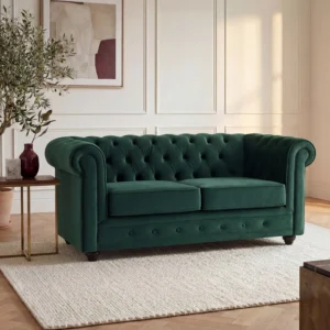 Canapé Chesterfield deux places vert en velours avec dossier capitonné