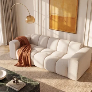 Canapé Maison Céphy CALESO en chenille beige avec assise matelassée et accoudoirs
