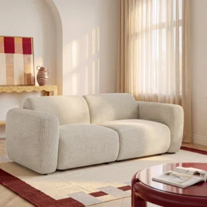 Canapé POGNI Maison Céphy beige en velours côtelé, trois places et accoudoirs