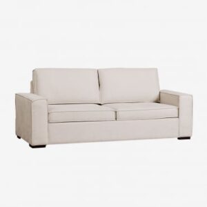 Canapé-lit Oleguer beige crème ouvert en couchage dans un salon