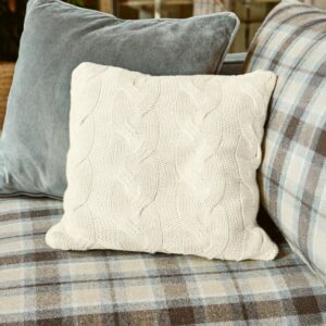 Housse de coussin Arnhem en maille de coton à motifs tressés