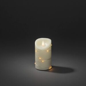 Bougie LED Konstsmide en cire crème avec lumière ambre, haute de 13 cm