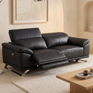 Canapé AZIDEE II noir à trois places, en cuir, avec relaxation électrique.