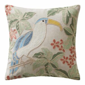 Housse de coussin Madura Tucana brodée d’un toucan bleuté sur fond écru