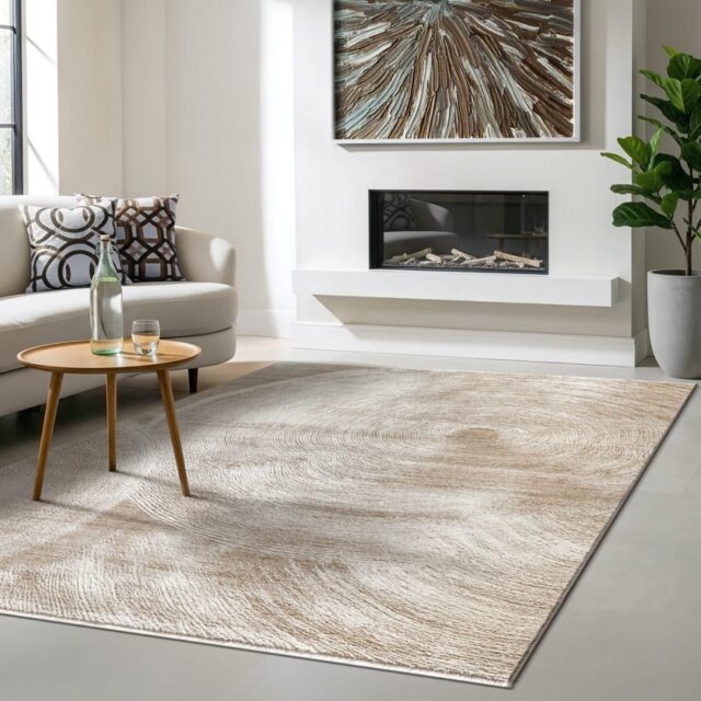 Tapis The carpet Nuvra beige à motif circulaire, format 160 x 230 cm